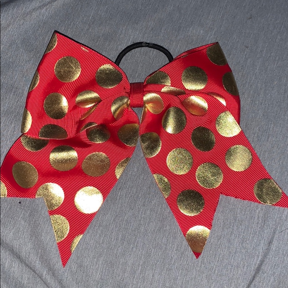 Red and gold polkadot bow